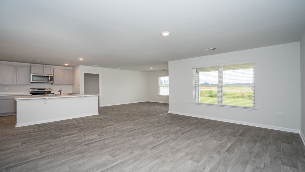Representative unfurnished interior of a home built from the ARIA by D.R. Horton in The Meadows at Wildwood Village, Shallotte (Image 23). Representative unfurnished interior of a home built from the ARIA by D.R. Horton in The Meadows at Wildwood Village, Shallotte (Image 23).