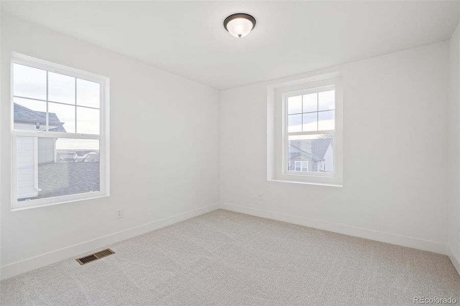 Spacious, unfurnished interior of a new home in Windsong, Thornton (Image 22).