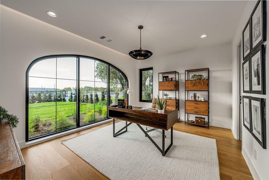 Office area featuring recessed lighting and light wood finished floors Office area featuring recessed lighting and light wood finished floors