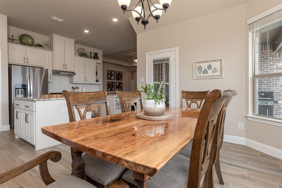 Breakfast dining area with custom windows