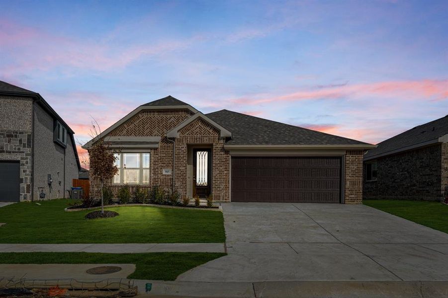 Front exterior of a new home in Eagle Glen Elements, Alvarado, TX, highlighting curb appeal (Image 2).