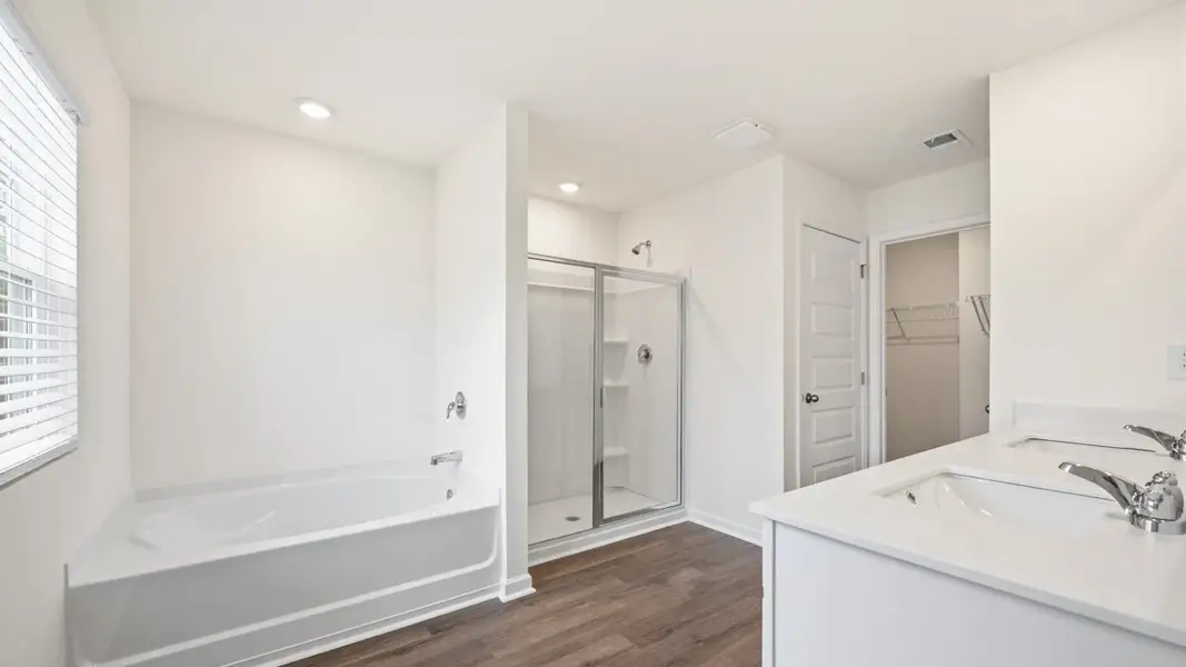 Representative furnished interior of a home built from the Sudbury by D.R. Horton in Echo Glen, Stockbridge (Image 6).