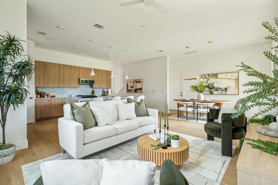An open-concept living area provides a bright, connected space for gathering and entertaining. An open-concept living area provides a bright, connected space for gathering and entertaining.