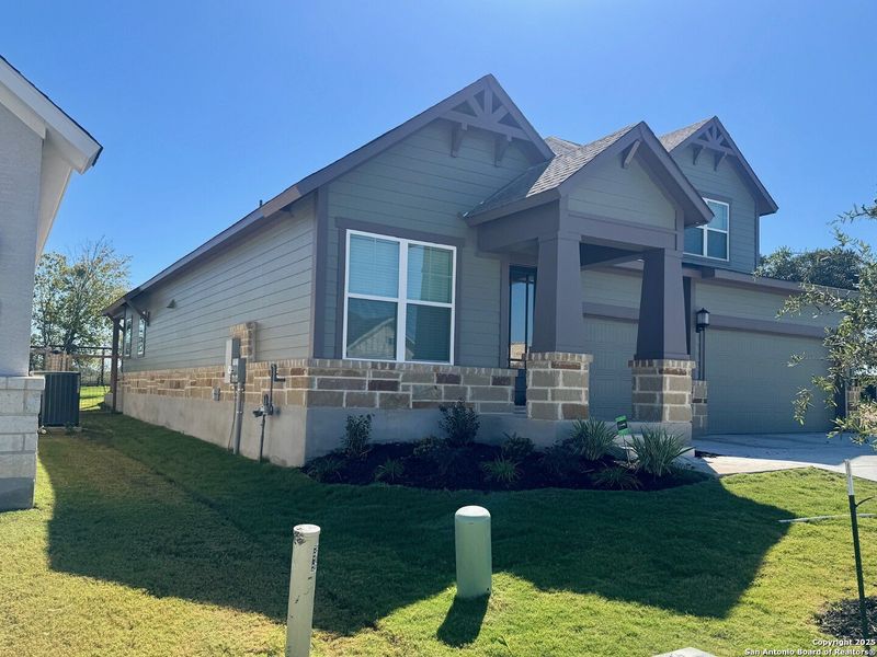 Front exterior of a new home in The Crossvine 55’, Schertz, TX, highlighting curb appeal (Image 2).