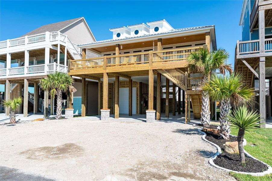 Front exterior of a new home in , Bolivar Peninsula, TX, highlighting curb appeal (Image 22).