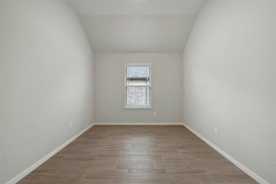 Spacious, unfurnished interior of a new home in Woodstone, Providence Village (Image 19).