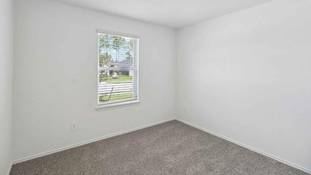 Spacious, unfurnished interior of a new home in Grand Pines, Magnolia (Image 12).