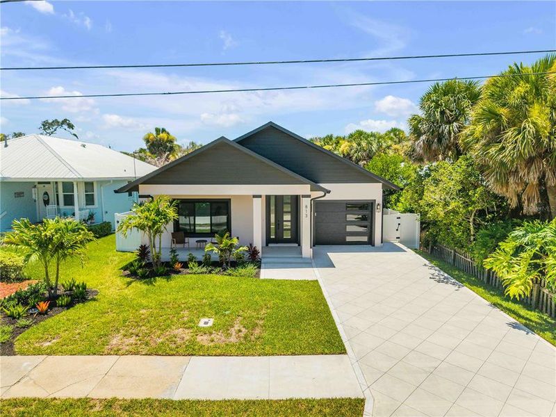 Front exterior of a new home in , New Smyrna Beach, FL, highlighting curb appeal (Image 29). Front exterior of a new home in , New Smyrna Beach, FL, highlighting curb appeal (Image 29).