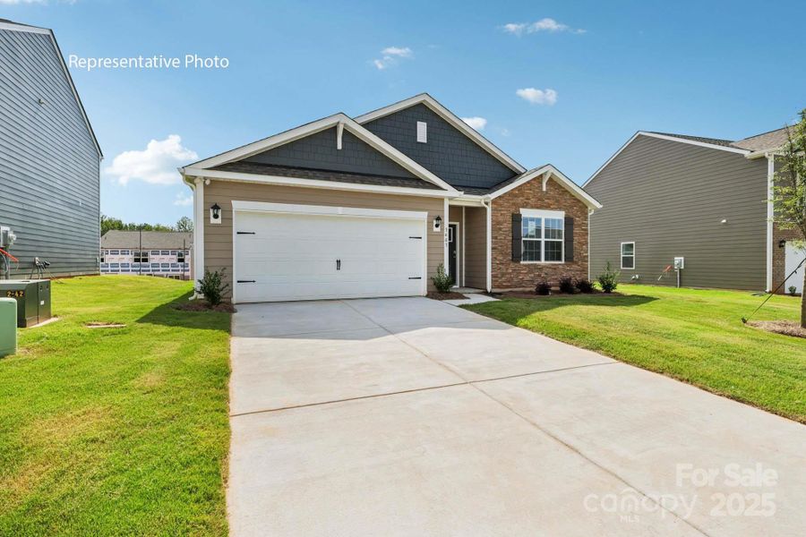 Front exterior of a new home in Brandon Creek, Gastonia, NC, highlighting curb appeal (Image 21). Front exterior of a new home in Brandon Creek, Gastonia, NC, highlighting curb appeal (Image 21).