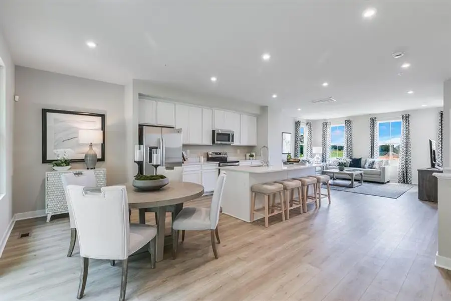 Furnished interior in a model home at Townes at The Station in Apex (Image 9).