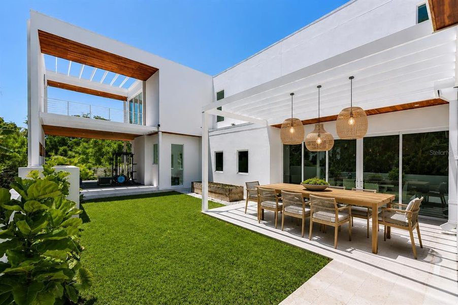 Exterior details and patio area of a home in , Sarasota (Image 38).