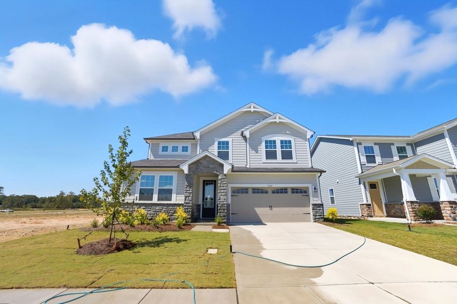 Front exterior of a new home in Waxhaw Landing, Monroe, NC, highlighting curb appeal (Image 18).