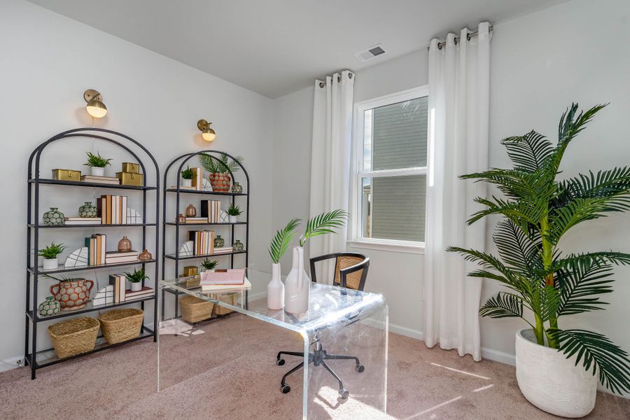 Representative furnished interior of a home built from the CALI by D.R. Horton in Kingston Bay, Conway (Image 10).