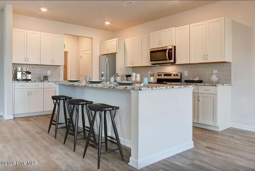 Furnished interior view inside a new home in Coastal Haven, Leland (Image 2).