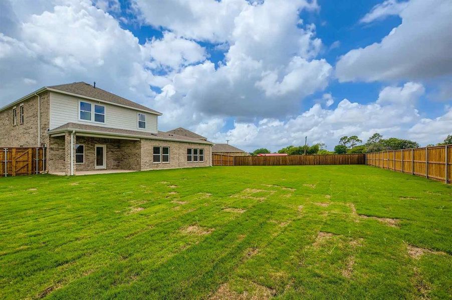 Exterior details and patio area of a home in The Estates Collection at Overland Grove, Forney (Image 3).
