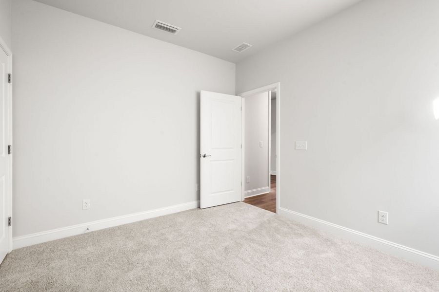 Spacious, unfurnished interior of a new home in Midpoint at New Riverside, Bluffton (Image 30).