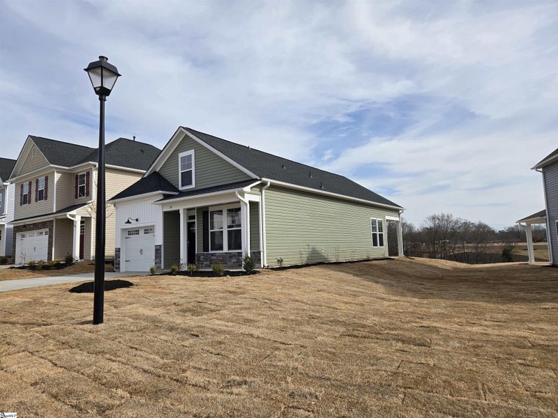 Exterior details and patio area of a home in Halton Oaks, Spartanburg (Image 3).