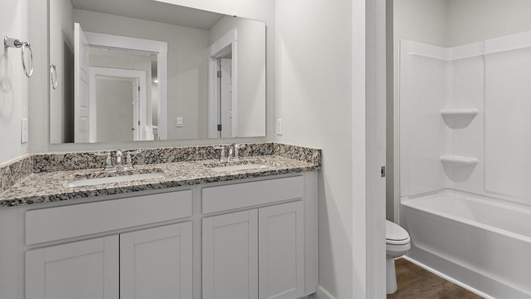 Furnished interior view inside a new home in Driftwood, Richlands (Image 12).