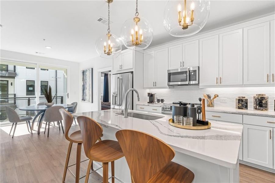 Can you imagine yourself cooking here? Counter space galore!*Images from the model home. Not subject unit*