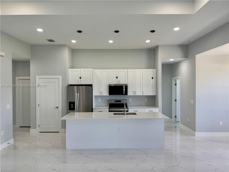 Furnished interior view inside a new home in , Cape Coral (Image 6). Furnished interior view inside a new home in , Cape Coral (Image 6).