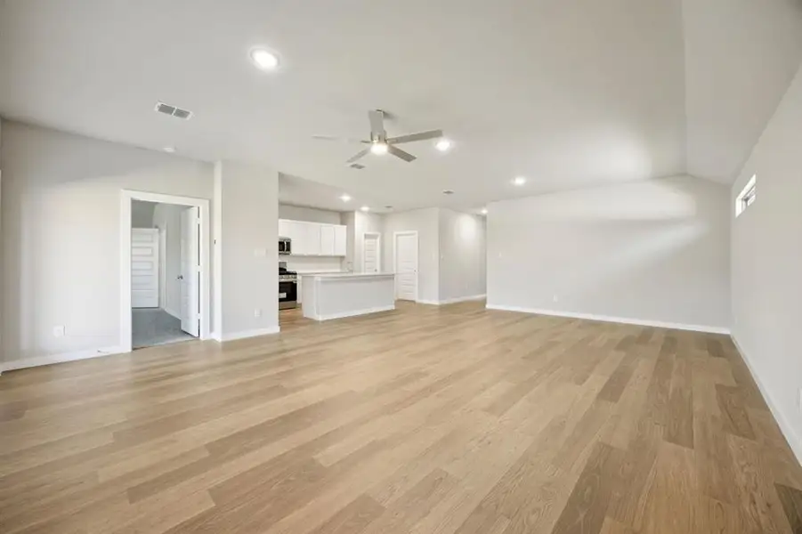 Open Floor Plan in the Oscar home plan by Trophy Signature Homes – REPRESENTATIVE PHOTO