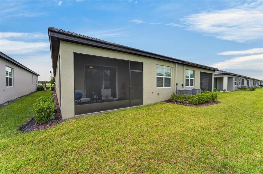 Exterior details and patio area of a home in , Parrish (Image 4).