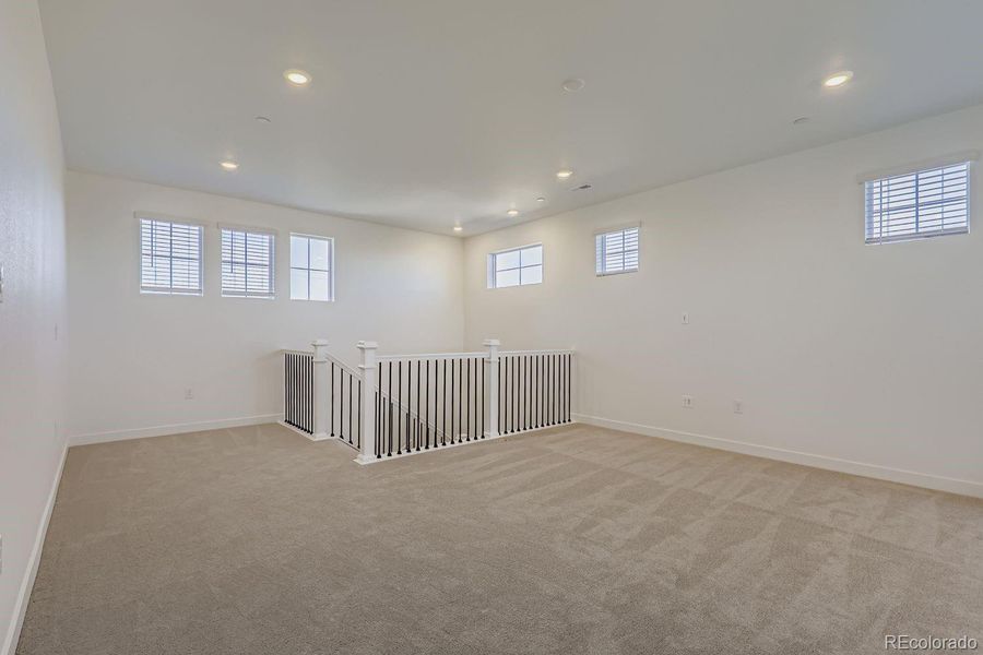 Spacious, unfurnished interior of a new home in Sunset Village: The Grand Collection, Erie (Image 11).