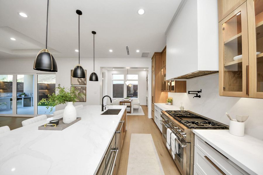 Custom cabinetry spans from wall to wall