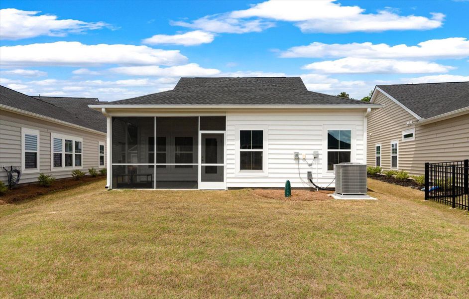 Exterior details and patio area of a home in Horizons at Summers Corner | 55+, Summerville (Image 26).