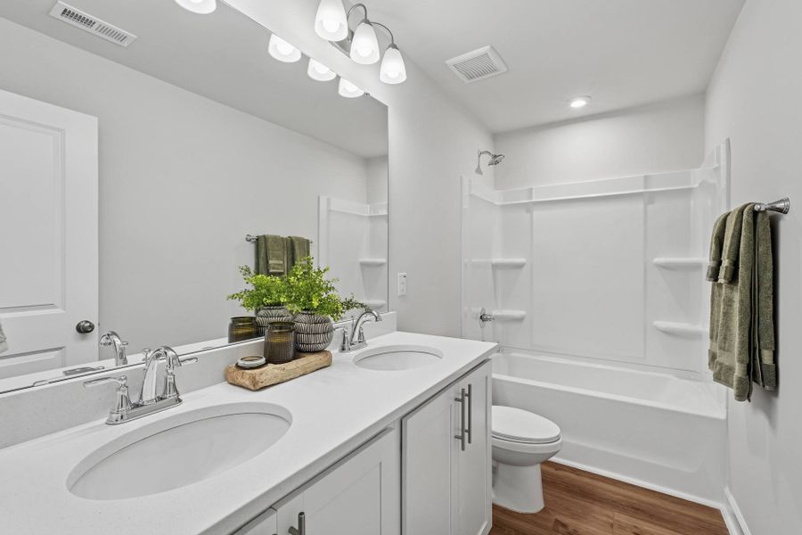 Representative furnished interior of a home built from the Eno by Tri Pointe Homes in Tredenham, Durham (Image 14).