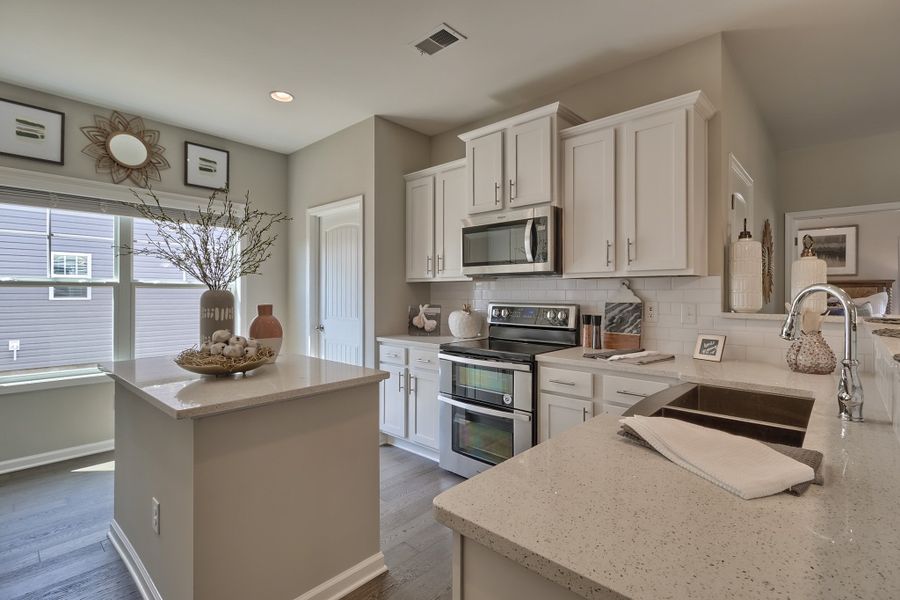 Representative furnished interior of a home built from the Wisteria II by Great Southern Homes in Briarfield, Conway (Image 15).