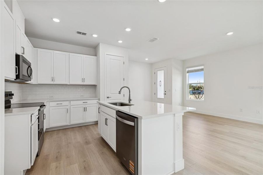 Furnished interior view inside a new home in North River Ranch – Townhomes, Parrish (Image 9).