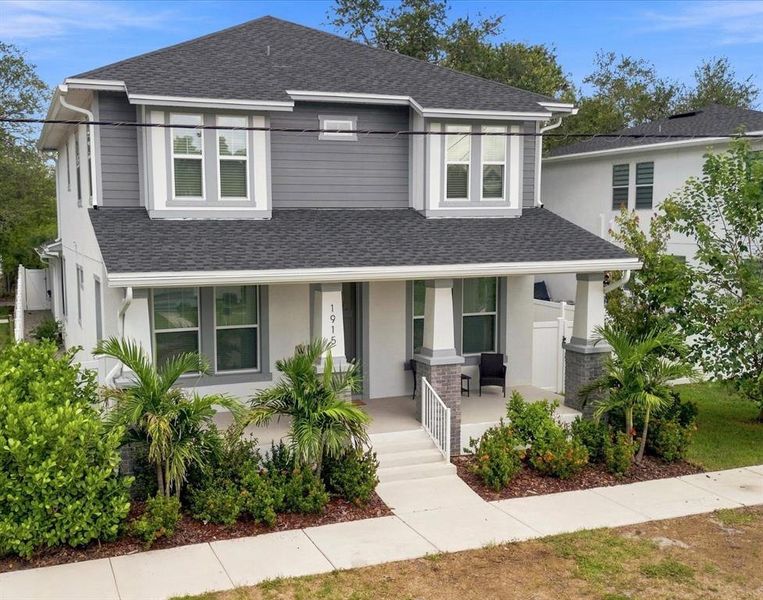 Front exterior of a new home in , Tampa, FL, highlighting curb appeal (Image 24). Front exterior of a new home in , Tampa, FL, highlighting curb appeal (Image 24).