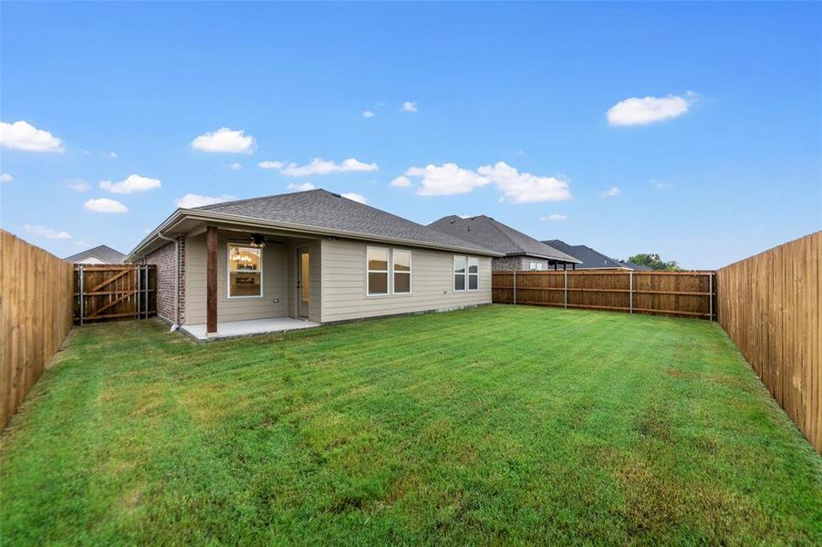 Front exterior of a new home in , Greenville, TX, highlighting curb appeal (Image 2). Front exterior of a new home in , Greenville, TX, highlighting curb appeal (Image 2).