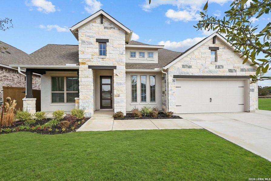 Front exterior of a new home in Stillwater Ranch, San Antonio, TX, highlighting curb appeal (Image 21).