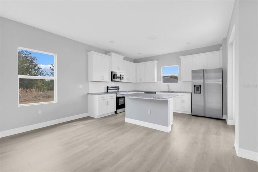 Furnished interior view inside a new home in , Port Charlotte (Image 5).