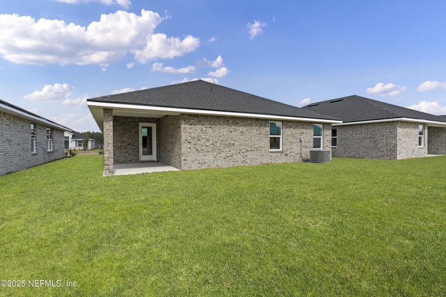Exterior details and patio area of a home in , Green Cove Springs (Image 3). Exterior details and patio area of a home in , Green Cove Springs (Image 3).