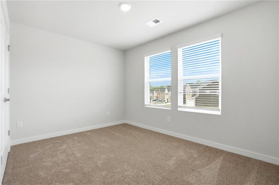 Spacious, unfurnished interior of a new home in Creekbend Overlook, South Fulton (Image 23).