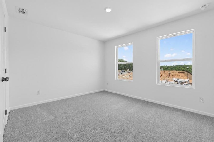 Spacious, unfurnished interior of a new home in Weatherfield, Buford (Image 29).