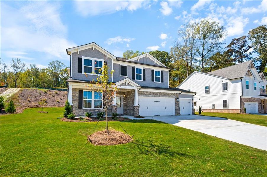 Front exterior of a new home in Hopewell Reserve, Cumming, GA, highlighting curb appeal (Image 29).