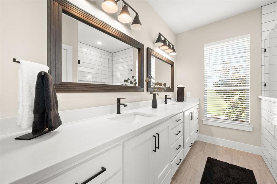 Bathroom with double sink and oversized vanity