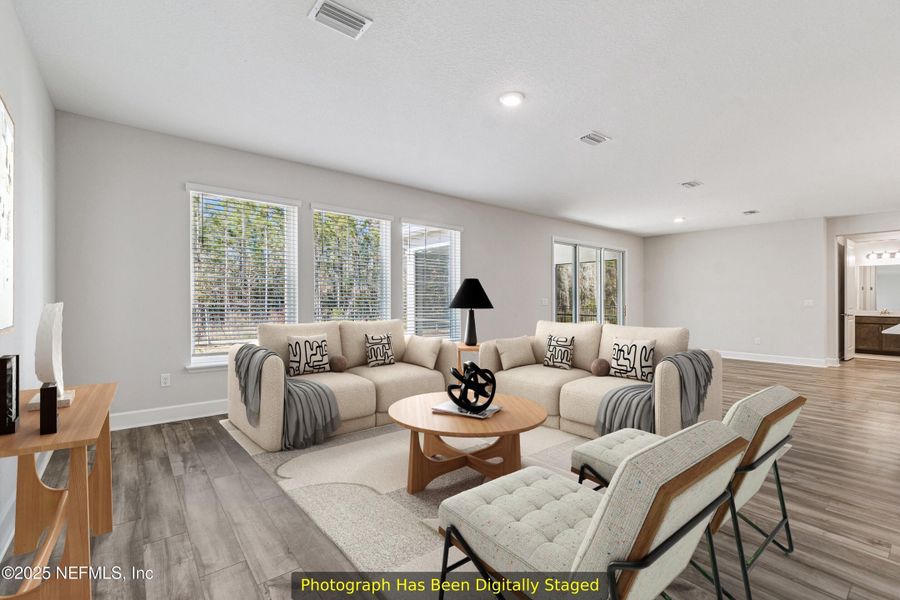 Furnished interior view inside a new home in Tributary 70', Yulee (Image 10).