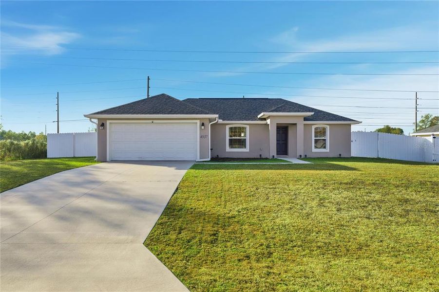 Front exterior of a new home in , Ocala, FL, highlighting curb appeal (Image 2). Front exterior of a new home in , Ocala, FL, highlighting curb appeal (Image 2).
