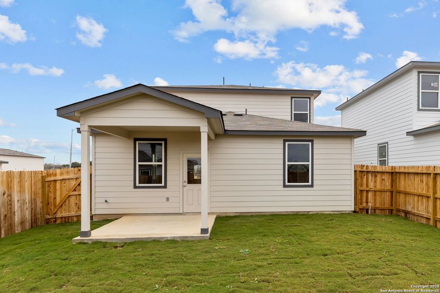 Front exterior of a new home in Applewhite Meadows, San Antonio, TX, highlighting curb appeal (Image 62). Front exterior of a new home in Applewhite Meadows, San Antonio, TX, highlighting curb appeal (Image 62).