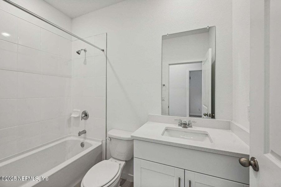 Furnished interior view inside a new home in Lakes at Bella Lago - Signature Series, Green Cove Springs (Image 5).