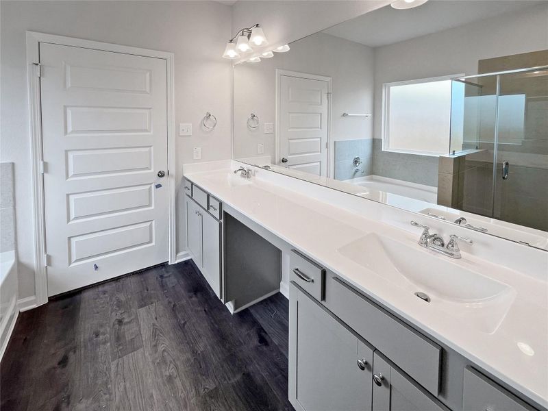 The Crawford- Primary Bathroom with Dual Sinks. Shower only, garden tub not included. Home under construction. Sample floor plan photo used for illustrative purposes only. Upgrades, selections options, windows and colors may vary. The Crawford- Primary Bathroom with Dual Sinks. Shower only, garden tub not included. Home under construction. Sample floor plan photo used for illustrative purposes only. Upgrades, selections options, windows and colors may vary.