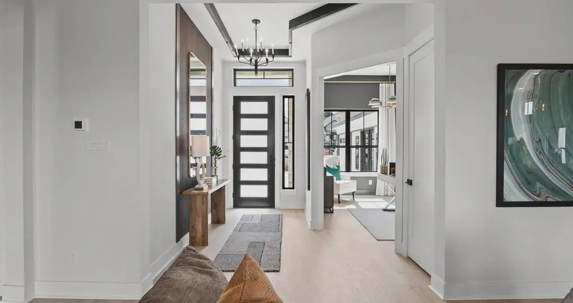 Representative furnished interior of a home built from the Stetson by Chesmar Homes in Sweetwater, Austin (Image 7).