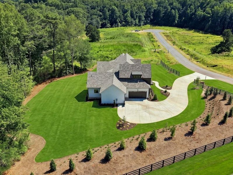 Front exterior of a new home in , Canton, GA, highlighting curb appeal (Image 33).