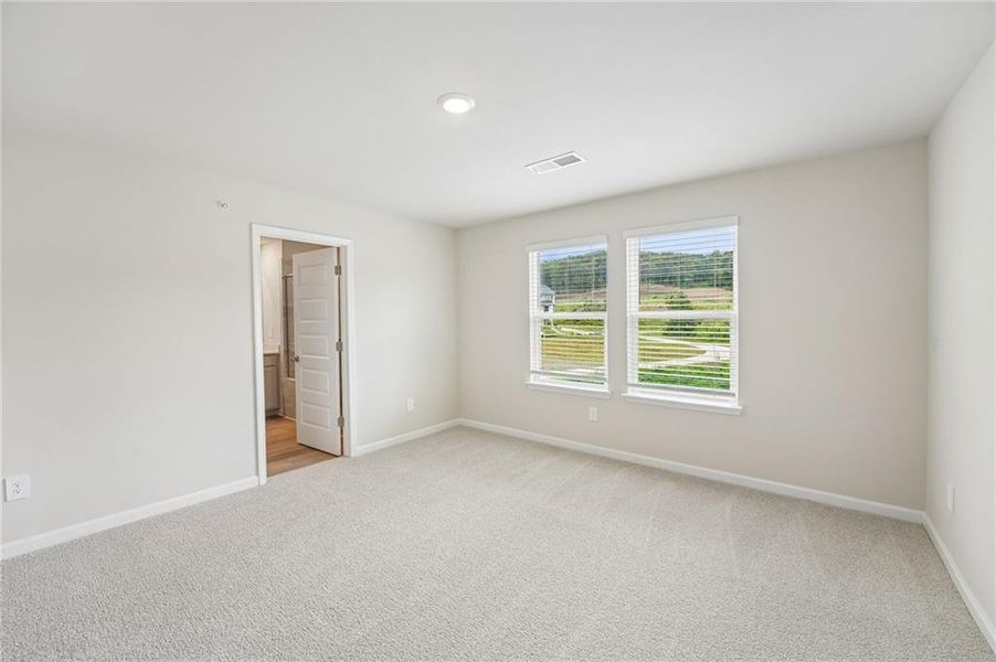 Spacious, unfurnished interior of a new home in Hemingway - Highland Series, Cumming (Image 40).