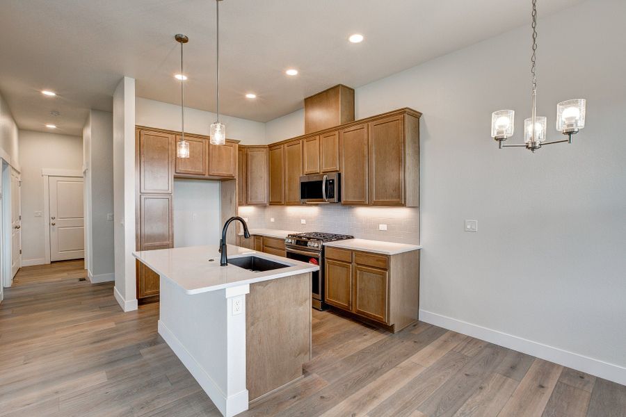 Representative furnished interior of a home built from the The Addison by Landmark Homes in The Lakes at Centerra, Loveland (Image 7). Representative furnished interior of a home built from the The Addison by Landmark Homes in The Lakes at Centerra, Loveland (Image 7).